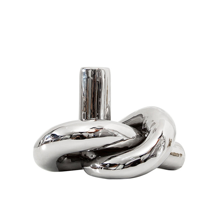 Twisted by nature, refined by artistry - silver