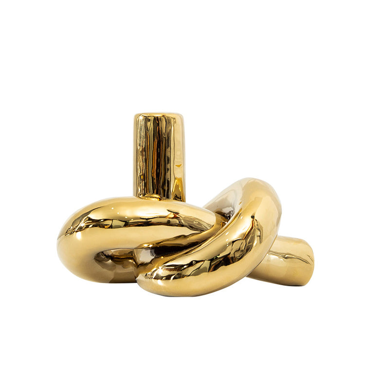 Twisted by nature, refined by artistry - gold